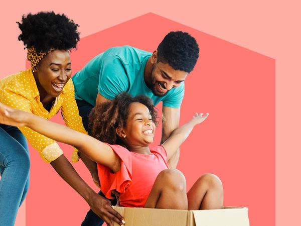 Happy parents and child playing on pink background